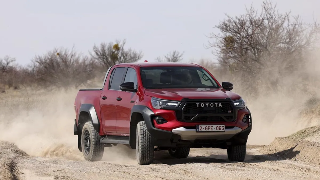 The Toyota Hilux GR Sport displays an imposing front end with its exclusive black grille, LED light signature and a look designed for off-road